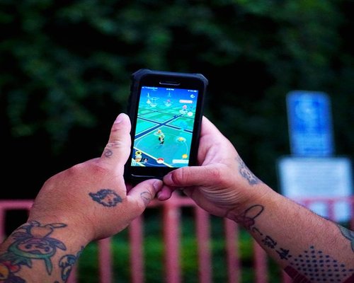 Smartphone displaying the fictional Crown Nation Trails game on CrownPlayNation Australia